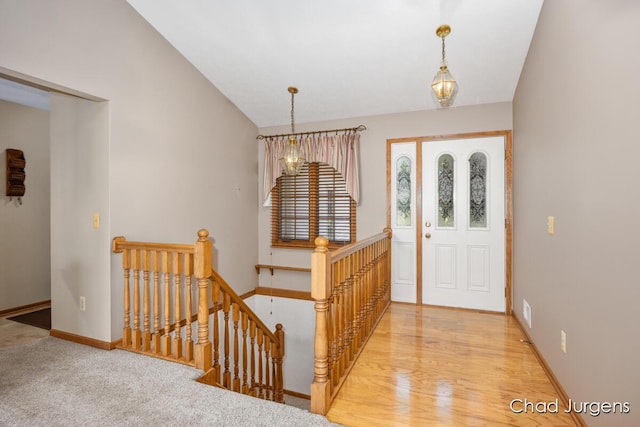 7564 Quincy St, Zeeland, MI 49464 - entrance foyer with baseboards and a chandelier
