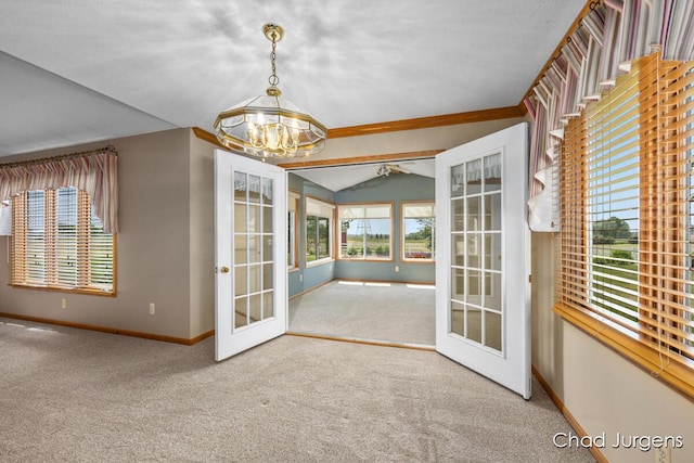 7564 Quincy St, Zeeland, MI 49464 - unfurnished sunroom featuring french doors, a chandelier, and lofted ceiling