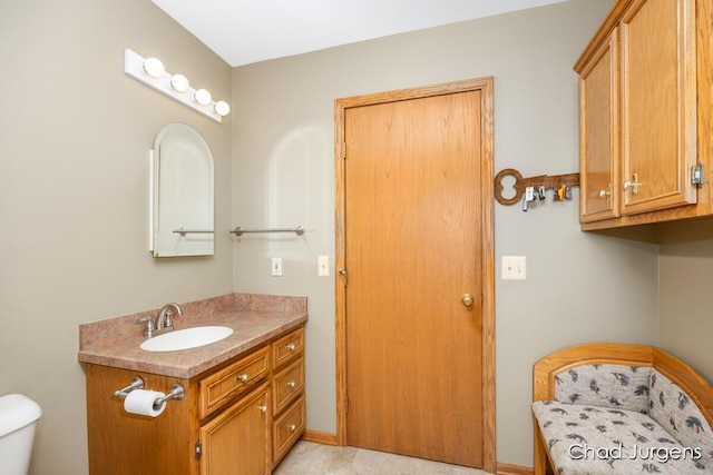 7564 Quincy St, Zeeland, MI 49464 - bathroom featuring vanity and toilet
