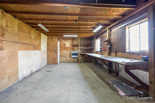 7564 Quincy St, Zeeland, MI 49464 - basement featuring a workshop area, plenty of natural light, and heating unit
