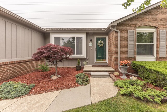 3929 Beech Dr, Ypsilanti, MI 48197 - doorway to property featuring brick siding