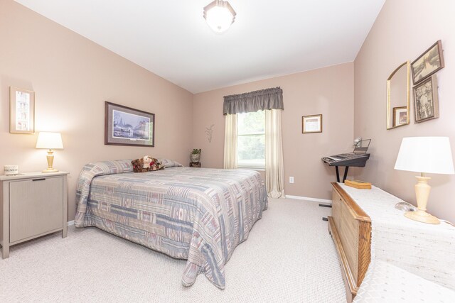 3929 Beech Dr, Ypsilanti, MI 48197 - bedroom with light colored carpet and baseboards