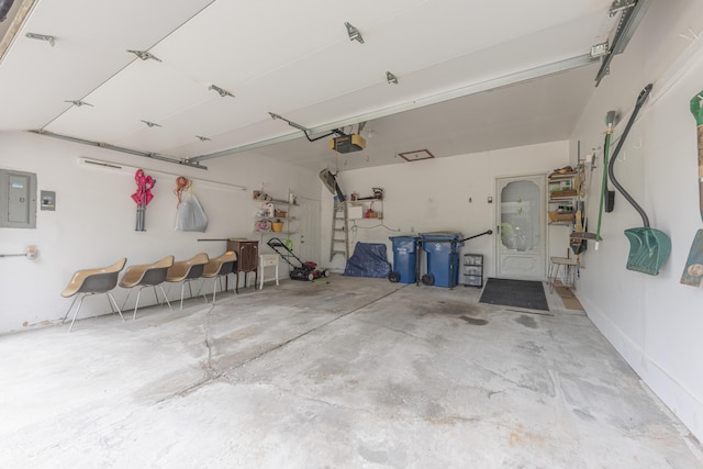 3929 Beech Dr, Ypsilanti, MI 48197 - garage with a garage door opener and electric panel