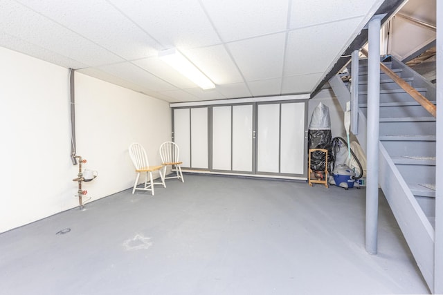 3929 Beech Dr, Ypsilanti, MI 48197 - below grade area with a drop ceiling and stairs