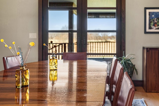 10258 Burgoyne Rd, Berrien Springs, MI 49103 - dining space featuring french doors and wood finished floors