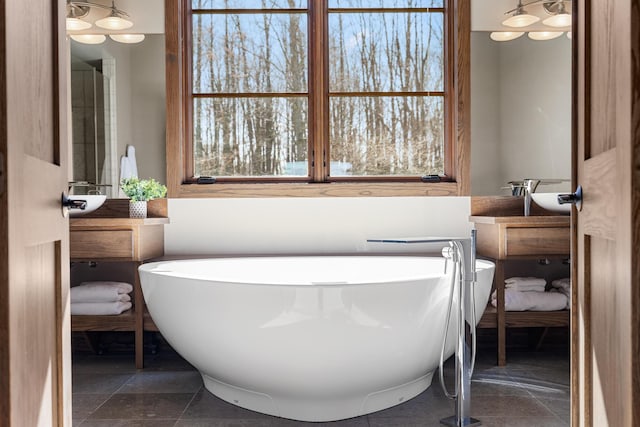 10258 Burgoyne Rd, Berrien Springs, MI 49103 - bathroom with a freestanding tub and vanity