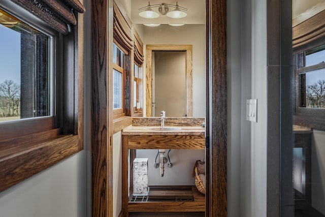 10258 Burgoyne Rd, Berrien Springs, MI 49103 - hallway featuring a sink