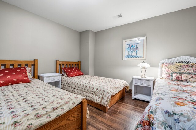 10258 Burgoyne Rd, Berrien Springs, MI 49103 - bedroom with dark wood-type flooring