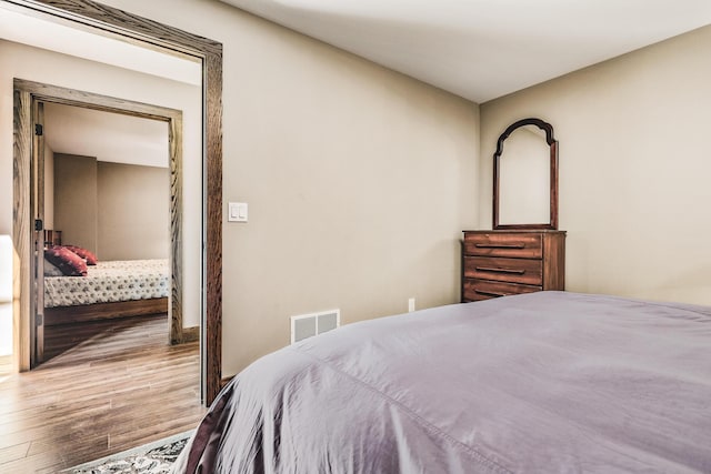 10258 Burgoyne Rd, Berrien Springs, MI 49103 - bedroom featuring wood finished floors