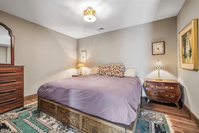 10258 Burgoyne Rd, Berrien Springs, MI 49103 - bedroom featuring baseboards and wood finished floors