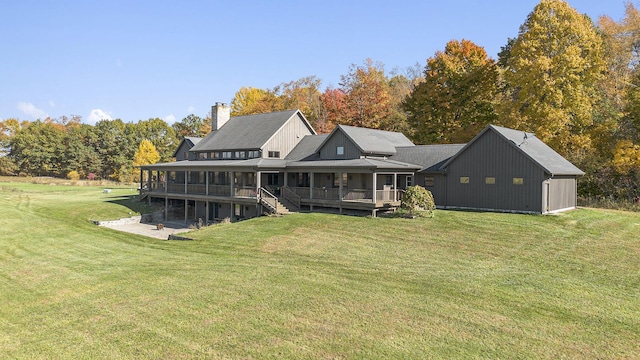 10258 Burgoyne Rd, Berrien Springs, MI 49103 - rear view of property featuring a lawn, a chimney, and a deck