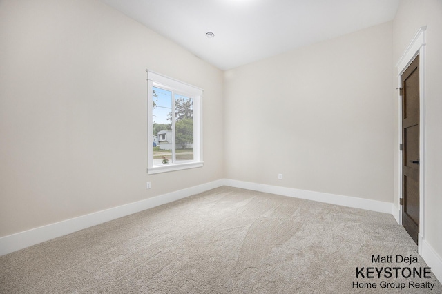 11012 Riverview Dr, Big Rapids, MI 49307 - carpeted empty room with baseboards
