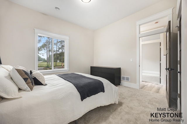 11012 Riverview Dr, Big Rapids, MI 49307 - carpeted bedroom featuring baseboards