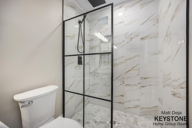 11012 Riverview Dr, Big Rapids, MI 49307 - full bath featuring toilet and a marble finish shower