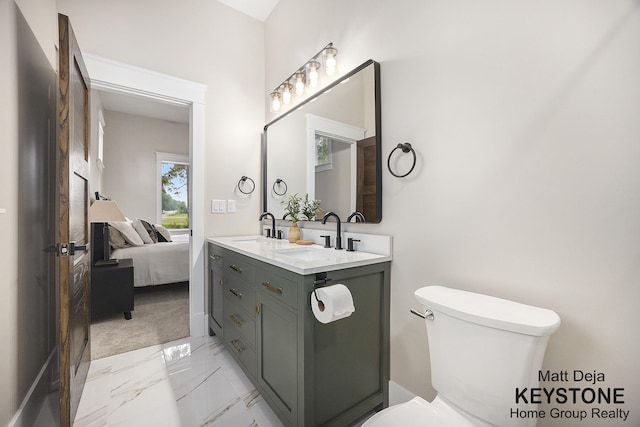 11012 Riverview Dr, Big Rapids, MI 49307 - ensuite bathroom with marble finish flooring and double vanity