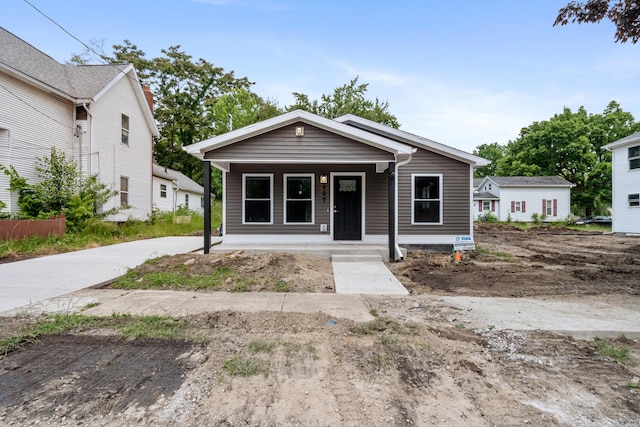 307 N Perrine St, Jackson, MI 49201 - view of front of property with covered porch