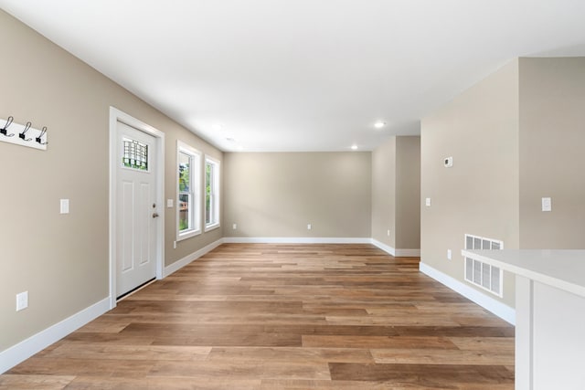 307 N Perrine St, Jackson, MI 49201 - empty room with recessed lighting and light wood finished floors