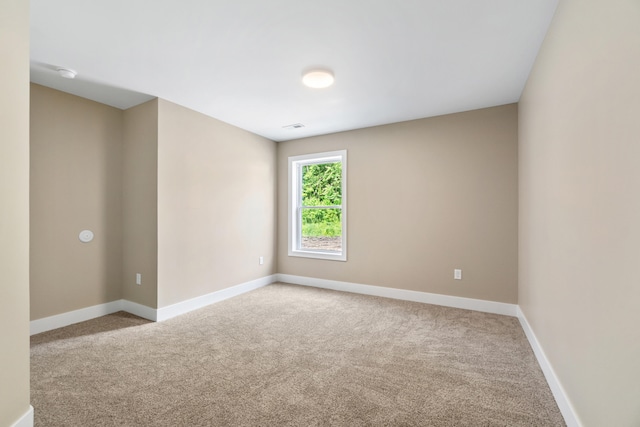 307 N Perrine St, Jackson, MI 49201 - empty room with carpet and a smoke detector