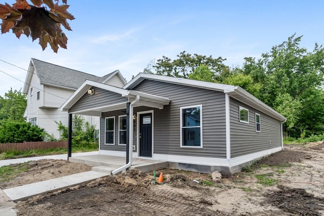 307 N Perrine St, Jackson, MI 49201 - view of front of house featuring covered porch