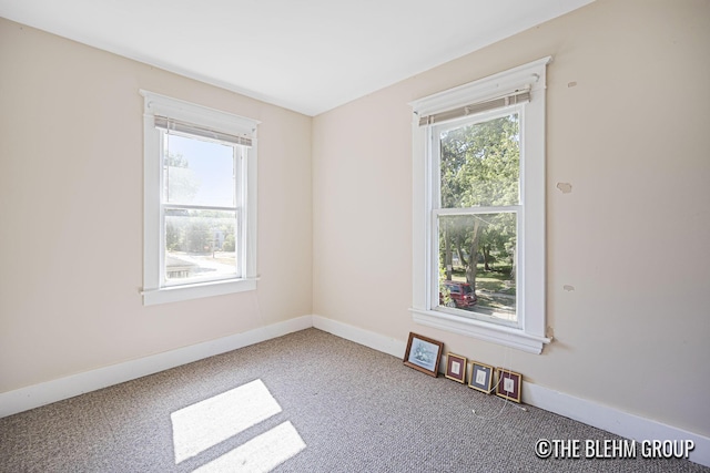 200 Richards Ave NW, Grand Rapids, MI 49504 - carpeted spare room featuring baseboards