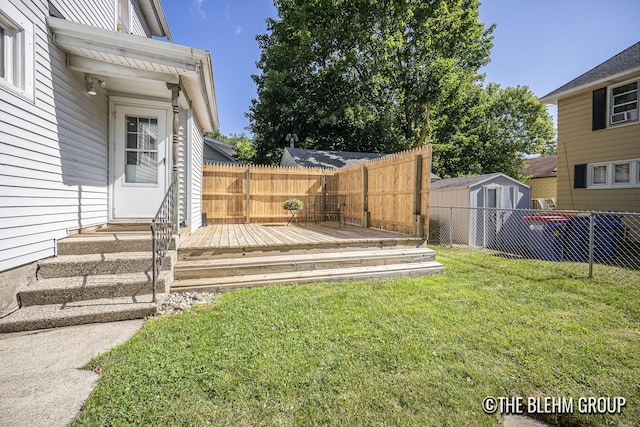 200 Richards Ave NW, Grand Rapids, MI 49504 - fenced backyard with a deck and a shed