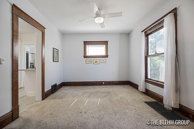 200 Richards Ave NW, Grand Rapids, MI 49504 - empty room with carpet floors and a ceiling fan