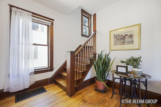 200 Richards Ave NW, Grand Rapids, MI 49504 - staircase with hardwood / wood-style flooring and baseboards