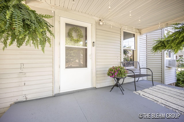 200 Richards Ave NW, Grand Rapids, MI 49504 - entrance to property featuring a porch and cooling unit