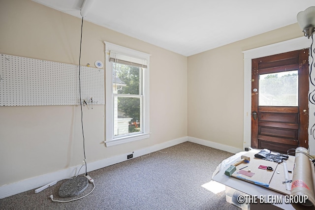 200 Richards Ave NW, Grand Rapids, MI 49504 - foyer with carpet flooring and baseboards