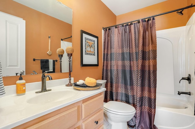 15532 Winchester Cir, Grand Haven, MI 49417 - full bathroom with vanity, toilet, and shower / bath combination with curtain