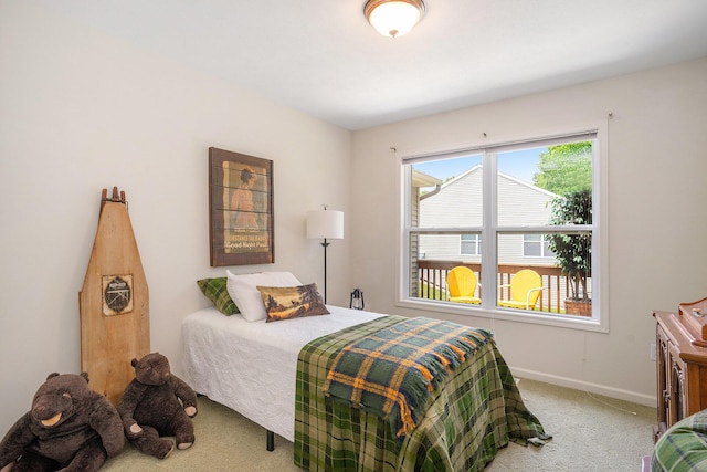 15532 Winchester Cir, Grand Haven, MI 49417 - bedroom with light carpet and baseboards