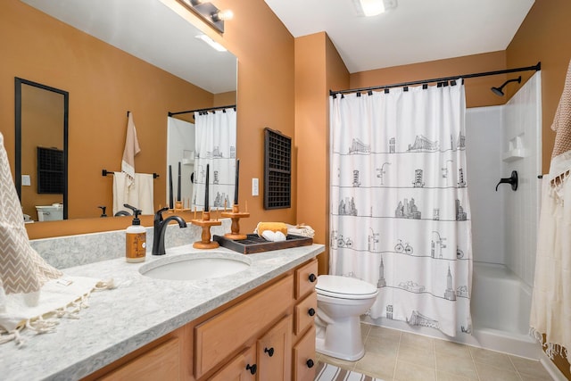 15532 Winchester Cir, Grand Haven, MI 49417 - bathroom with toilet, vanity, shower / tub combo with curtain, and tile patterned floors