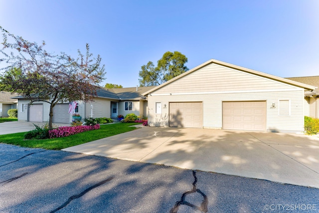 2883 Harmony Ct, Wyoming, MI 49519 - ranch-style home featuring driveway and an attached garage
