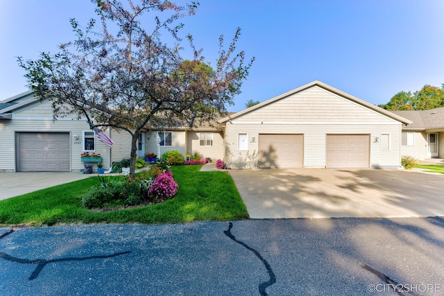 2883 Harmony Ct, Wyoming, MI 49519 - ranch-style home with a garage and a front lawn