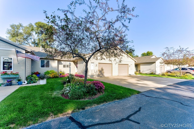 2883 Harmony Ct, Wyoming, MI 49519 - single story home featuring driveway, a front lawn, and an attached garage