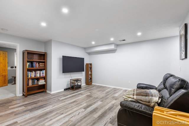 2883 Harmony Ct, Wyoming, MI 49519 - living area with light wood-style floors, recessed lighting, and baseboards