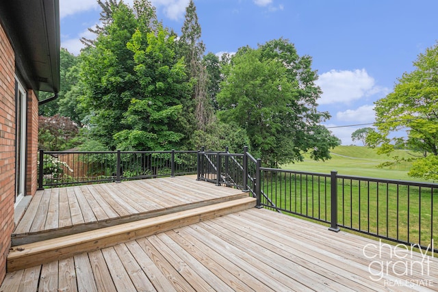 1757 Westlane Dr NE, Grand Rapids, MI 49505 - deck featuring a yard