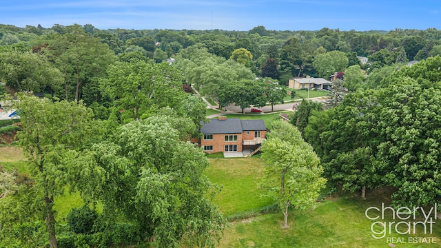 1757 Westlane Dr NE, Grand Rapids, MI 49505 - aerial view of property and surrounding area featuring a forest