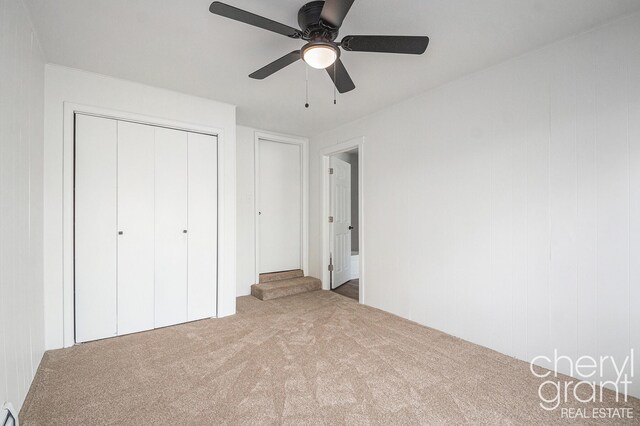 1757 Westlane Dr NE, Grand Rapids, MI 49505 - unfurnished bedroom with carpet floors, a closet, and a ceiling fan