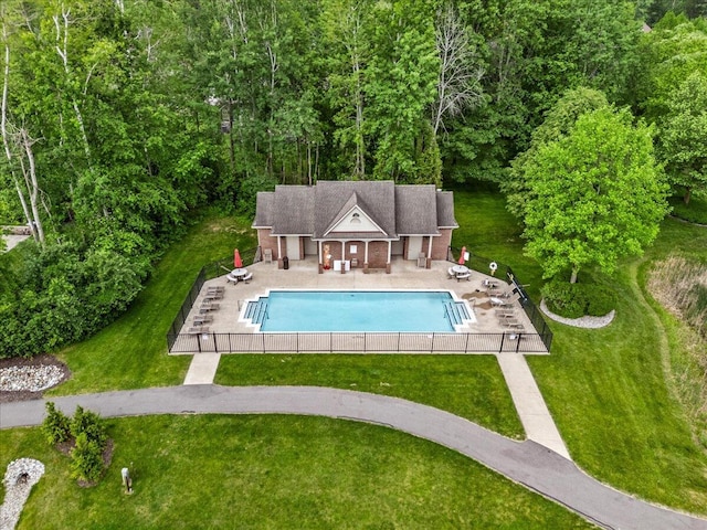 3667 Bay Harbor Dr, Brighton, MI 48114 - view of swimming pool with a patio and a lawn