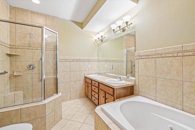 3667 Bay Harbor Dr, Brighton, MI 48114 - bathroom featuring tile walls, a whirlpool tub, a shower stall, double vanity, and tile patterned flooring
