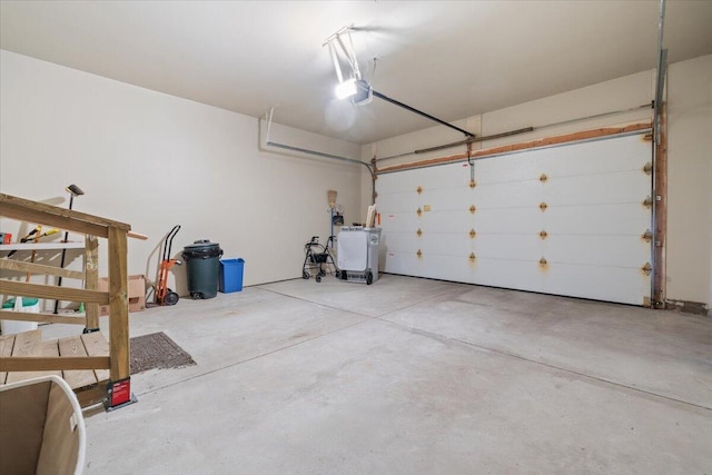 3667 Bay Harbor Dr, Brighton, MI 48114 - garage featuring a garage door opener