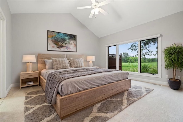 3667 Bay Harbor Dr, Brighton, MI 48114 - bedroom featuring light colored carpet, vaulted ceiling, and ceiling fan