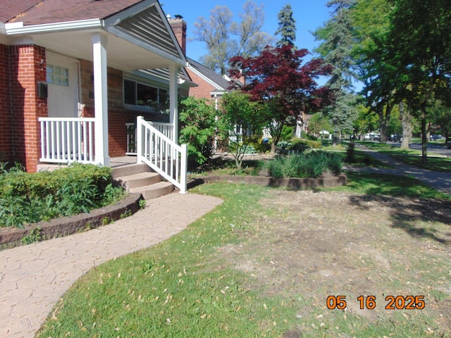 10114 Lincoln Dr, Huntington Woods, MI 48070 - view of yard featuring covered porch