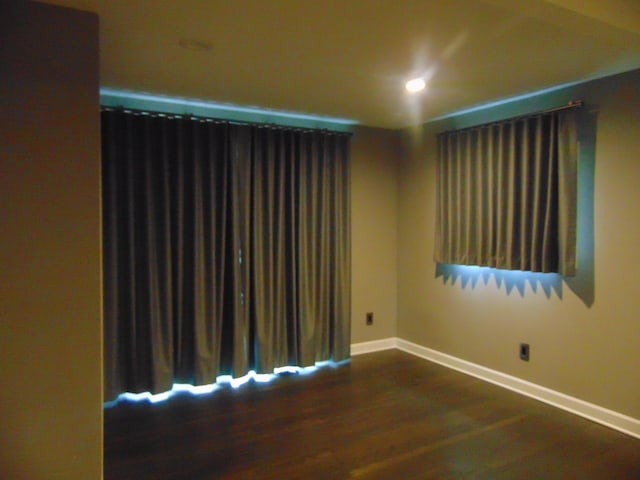 10114 Lincoln Dr, Huntington Woods, MI 48070 - empty room featuring baseboards and dark wood-type flooring