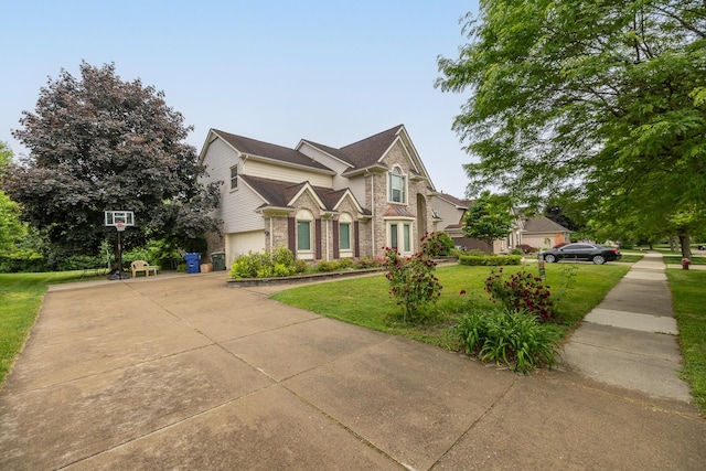 45801 Henley Dr, Canton, MI 48187 - traditional-style house with a front yard, concrete driveway, brick siding, and a garage