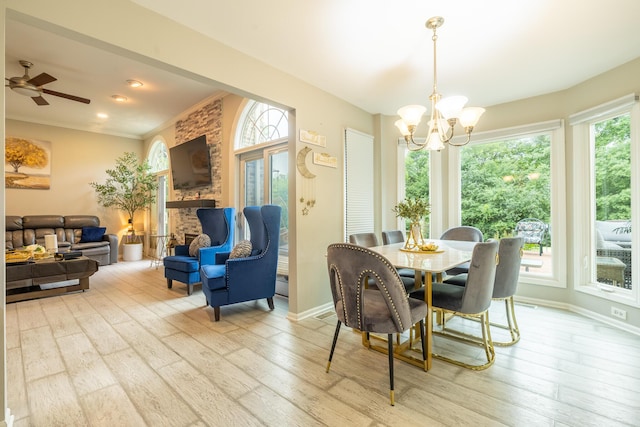 45801 Henley Dr, Canton, MI 48187 - dining area with wood finished floors, a chandelier, and ceiling fan