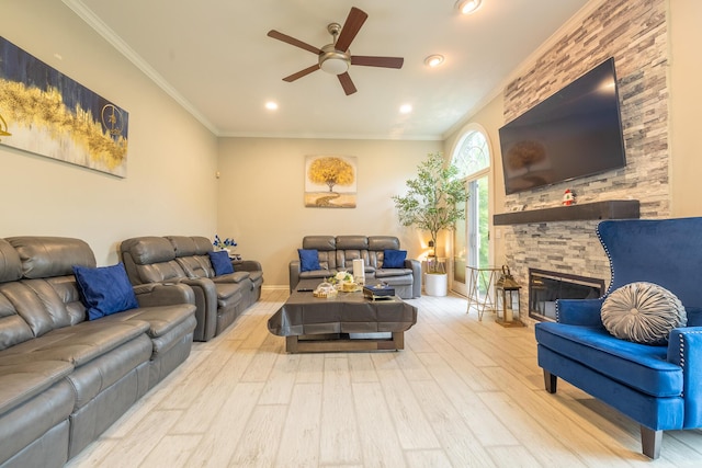 45801 Henley Dr, Canton, MI 48187 - living room with ceiling fan, wood finished floors, ornamental molding, recessed lighting, and a stone fireplace