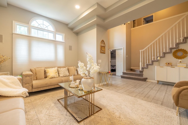 45801 Henley Dr, Canton, MI 48187 - living room featuring stairs, wood finished floors, and recessed lighting