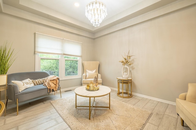 45801 Henley Dr, Canton, MI 48187 - sitting room featuring a chandelier, wood finished floors, recessed lighting, and a tray ceiling